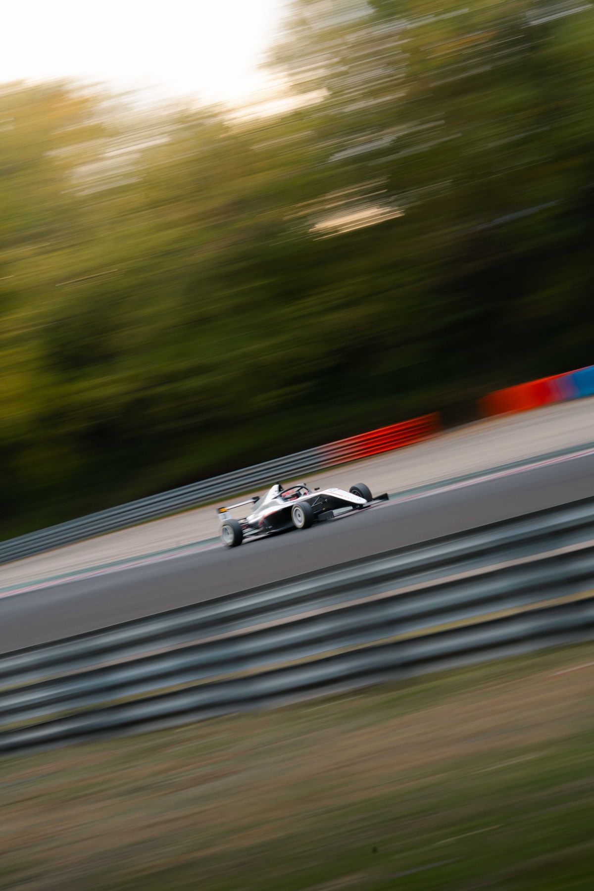 Archie Owen's Hitech F4 car at speed at the Hungaroring