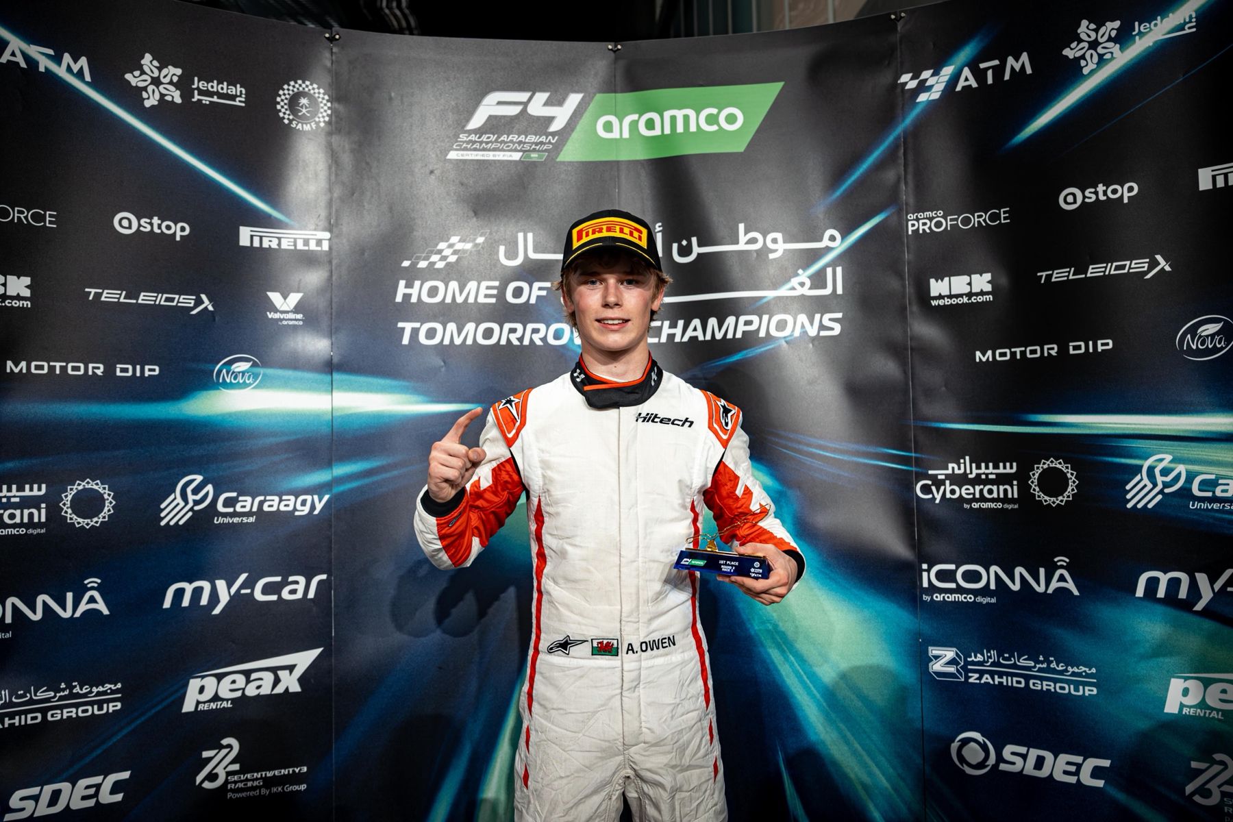 Archie Owen holding the first-place trophy for Saudi F4 Round 2 Race 2